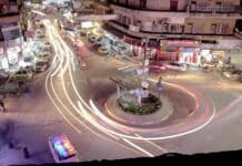 time lapse photography of cars on the road during night time