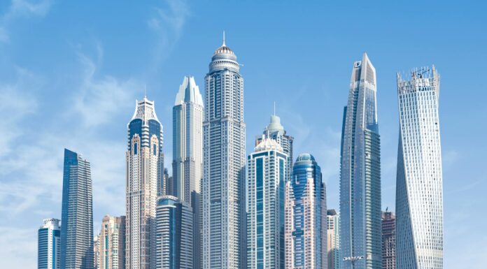concrete high rise buildings under blue sky