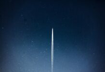 space shuttle launch during nighttime