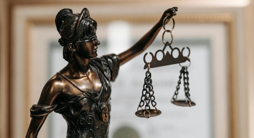 themis figurine at lawyers office