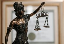 themis figurine at lawyers office