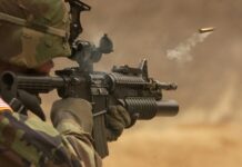 soldier holding rifle