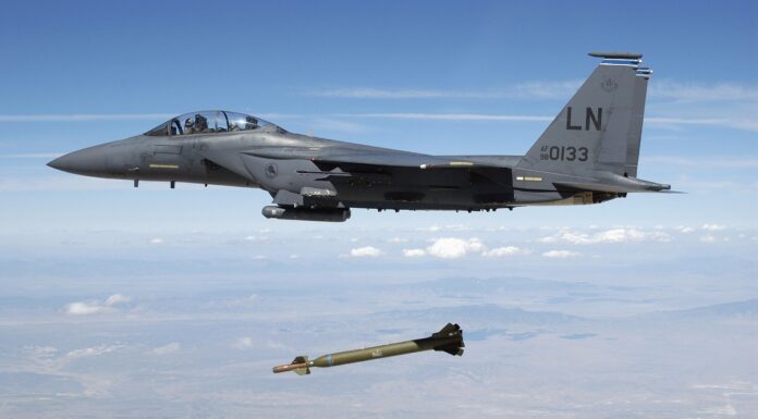 A US Air Force (USAF) F-15E Strike Eagle aircraft from the 492nd Fighter Squadron, Royal Air Force (RAF) Lakenheath, United Kingdom (UK) releases a GBU-28 "Bunker Buster" 5,000-pound Laser-Guided Bomb over the Utah Test and Training Range during a weapons evaluation test hosted by the 86th Fighter Weapons Squadron (FWS) from Eglin AFB, Florida (FL).
