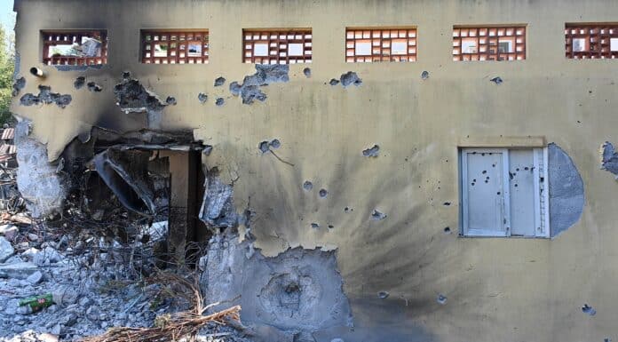 Kobi Gideon , Damaged building in the kibbutz Be'eri in Israel, following the October 7th massacre, Source Government Press Office of Israel