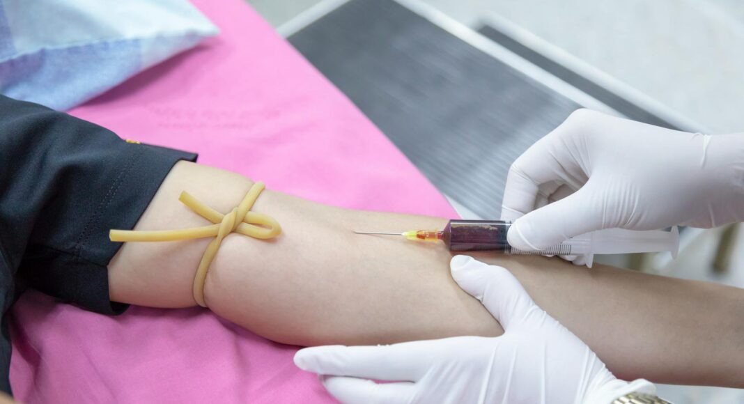 injecting of syringe on person s arm