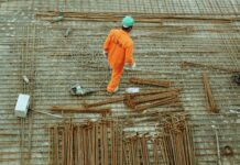 man walking on construction site