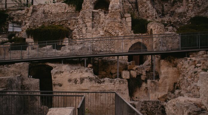 a stairway leading up to a cave like structure