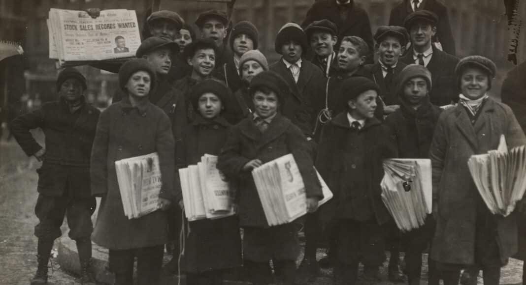 group of men standing on the street