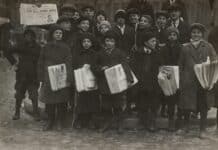 group of men standing on the street