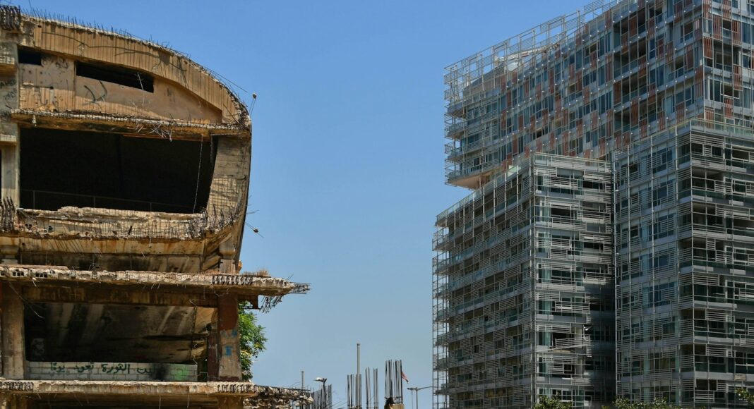 a very tall building sitting next to a very tall building