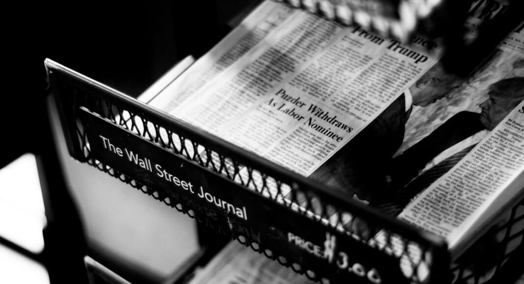 newspapers on The Wall Street Journal rack
