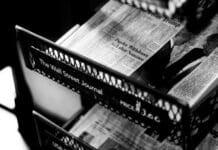 newspapers on The Wall Street Journal rack