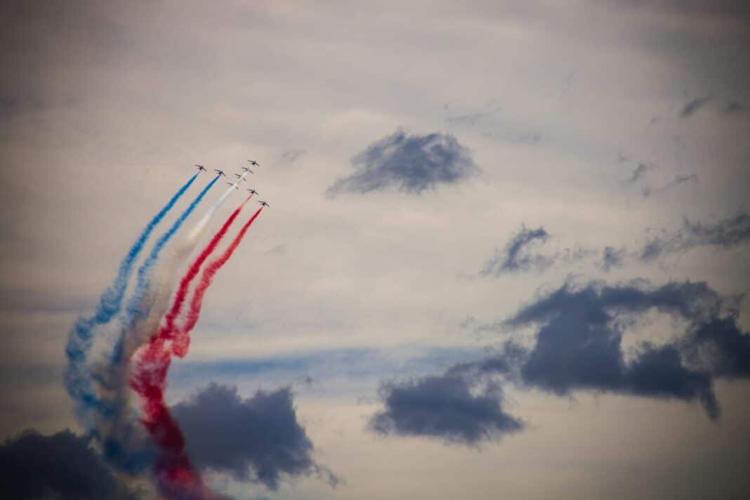 a group of jets flying in the sky