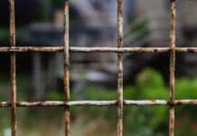 black metal fence during daytime