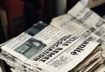 bundle of newspaper on table