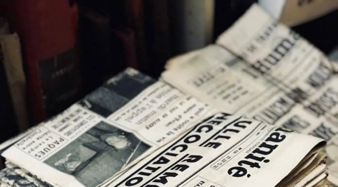 bundle of newspaper on table