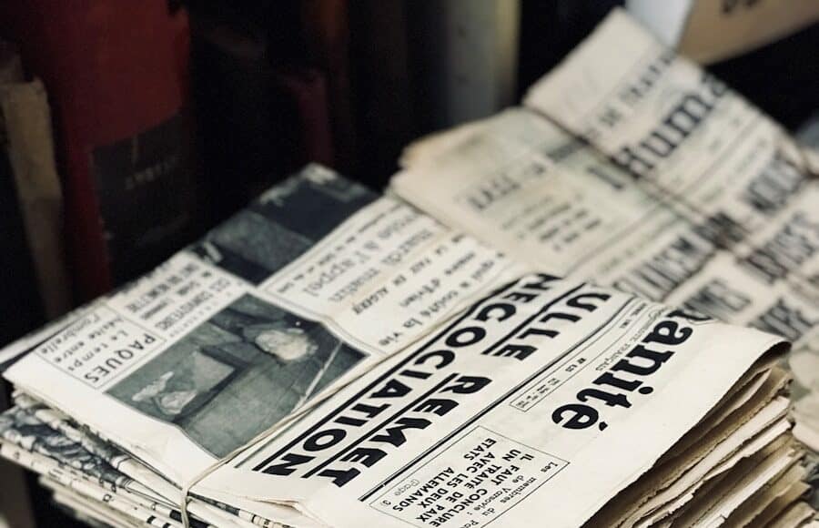 bundle of newspaper on table