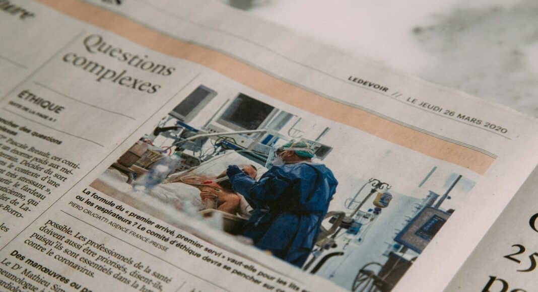 man in blue jacket and blue denim jeans