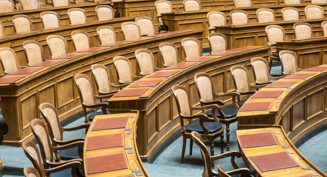 brown wooden chairs on blue and brown wooden floor