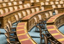 brown wooden chairs on blue and brown wooden floor