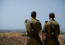 a couple of men in uniform