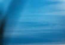 a large satellite dish sitting on top of a hill