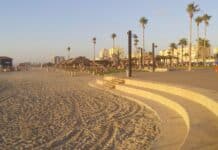 people walking on beach during daytime
