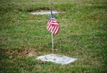us a flag on gray concrete