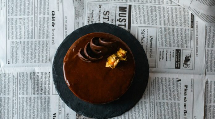 brown round plate on white newspaper
