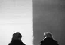 grayscale photo of woman and girl