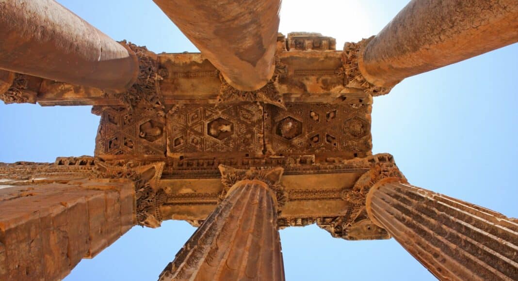 low angle photography of brown pillars