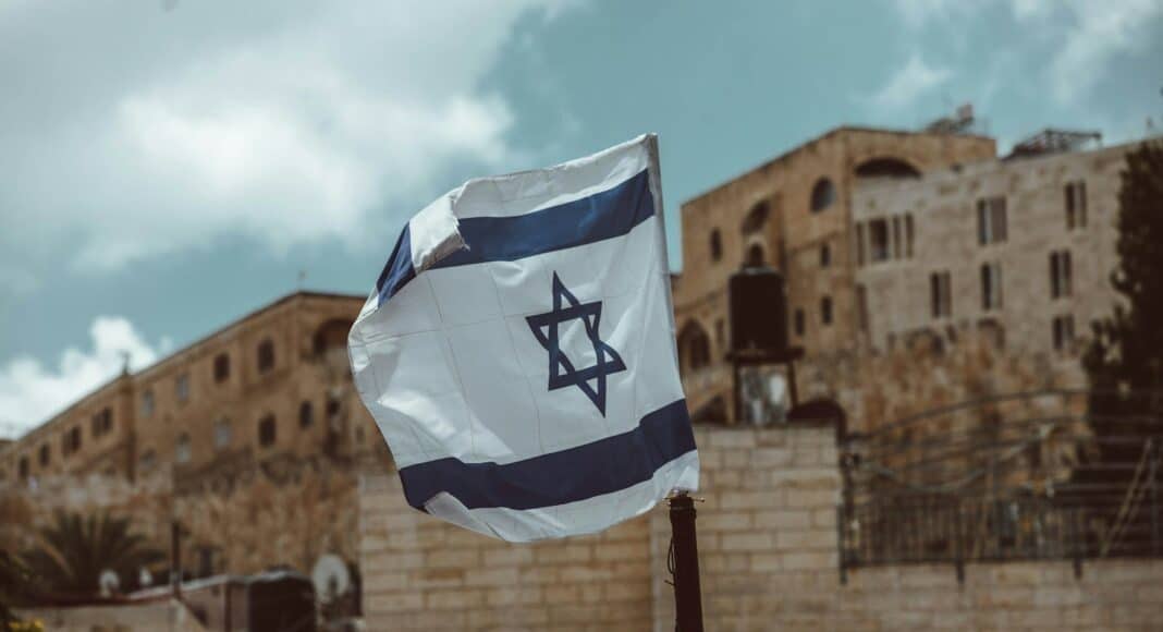 blue and white flag on pole