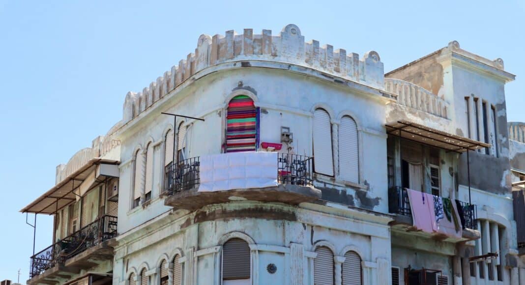 an old building with a balcony and balconies