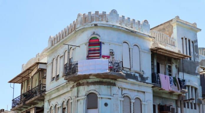 an old building with a balcony and balconies