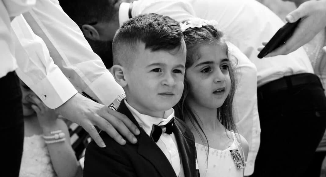 grayscale photo of man and woman smiling