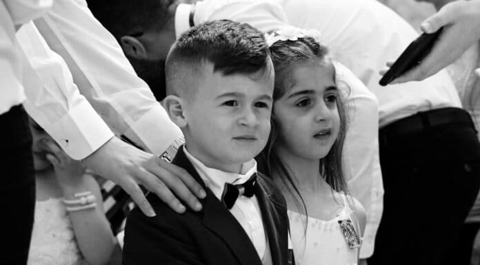 grayscale photo of man and woman smiling