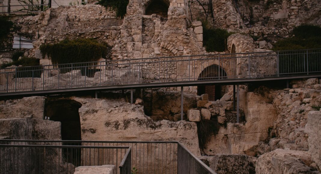 a stairway leading up to a cave like structure
