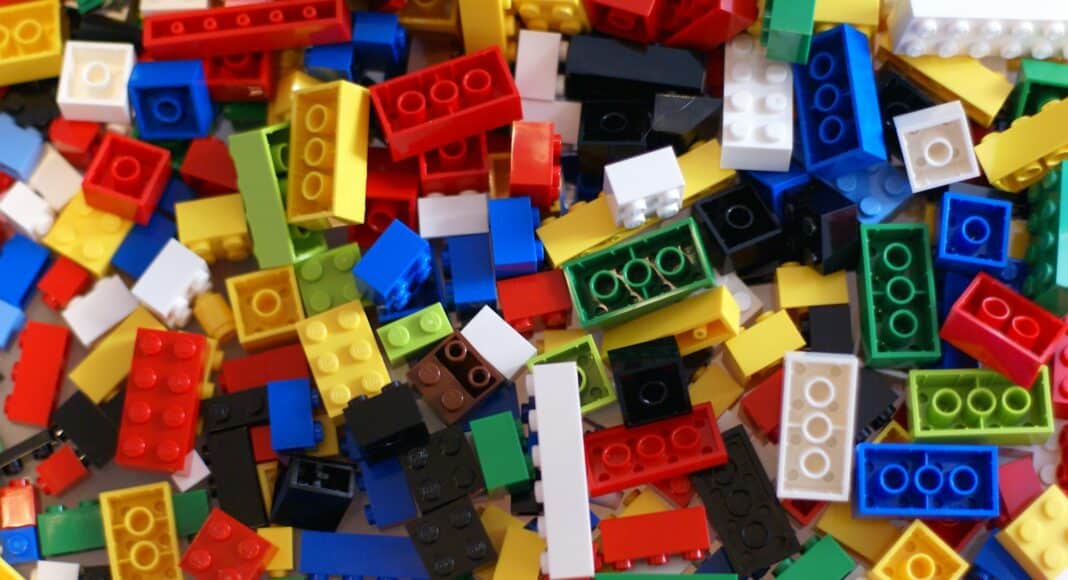 A pile of colorful legos sitting on top of a table