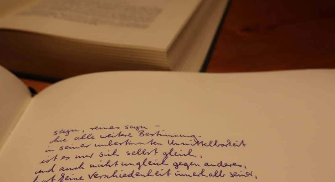 a close up of a book with writing on it