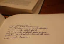 a close up of a book with writing on it