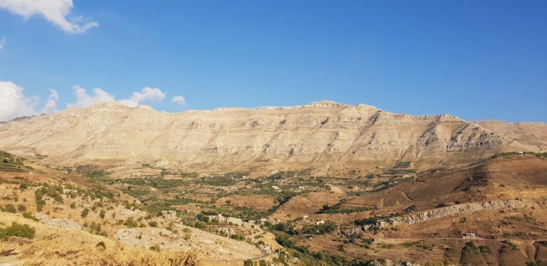 brown rocky mountain under blue sky during daytime