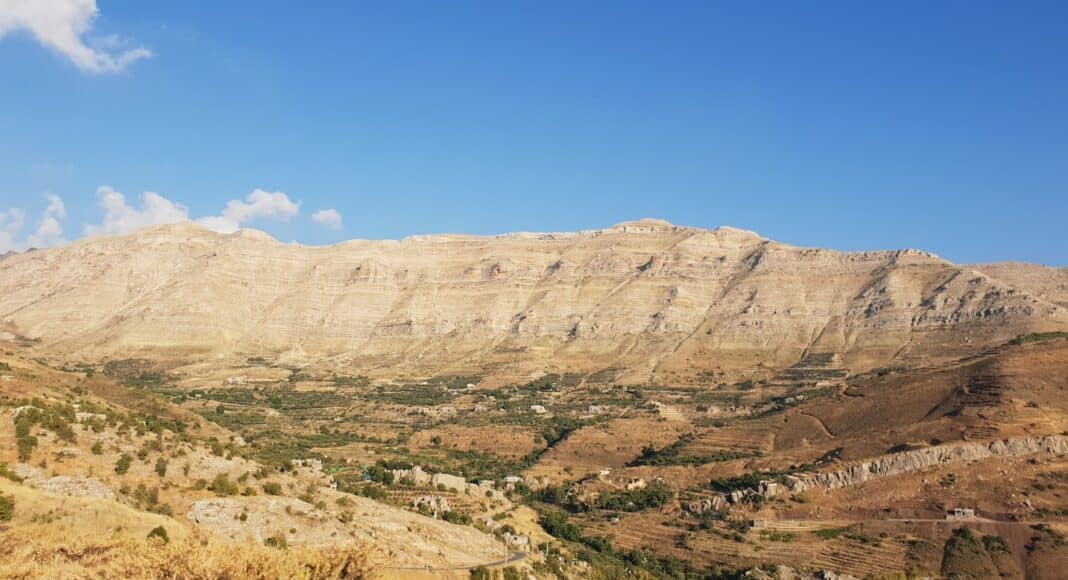 brown rocky mountain under blue sky during daytime