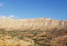 brown rocky mountain under blue sky during daytime