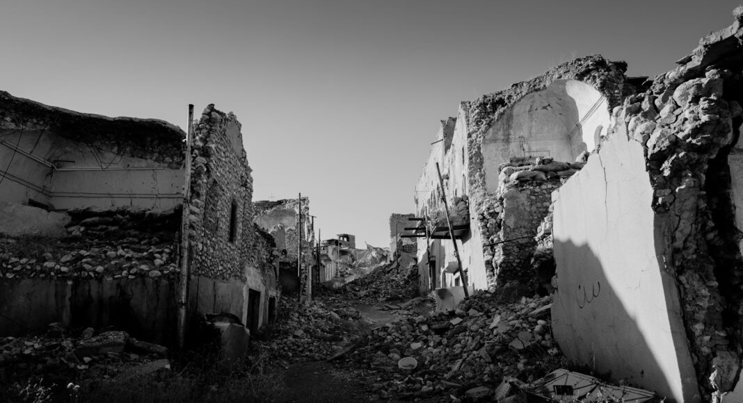 grayscale photo of concrete houses
