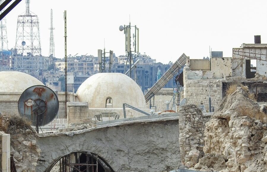 a couple of people that are walking down a street