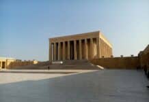 brown concrete building under blue sky during daytime