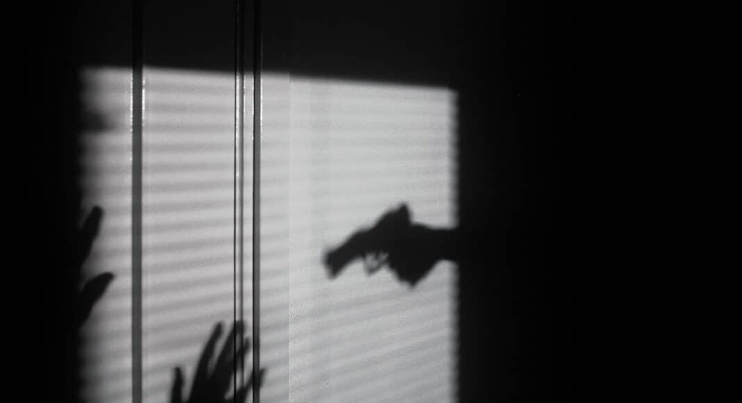 silhouette of person on window