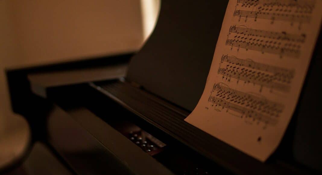musical notes on black piano