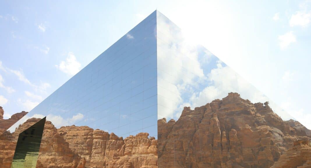 A large pyramid in the middle of a desert