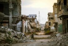 a destroyed building in a city